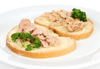Tasty sandwiches with tuna and cod liver, isolated on white