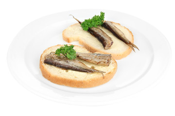Tasty sandwiches with sardines, isolated on white