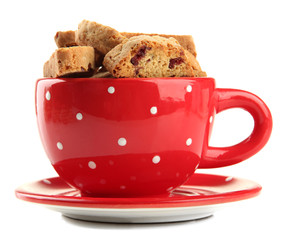 Tasty cookies in cup isolated on white