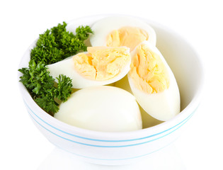 Boiled eggs in bowl isolated on white