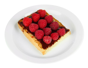 Delicious toast with raspberries isolated on white