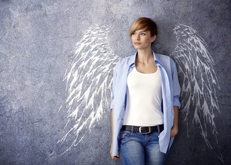 Attractive woman with angel wings