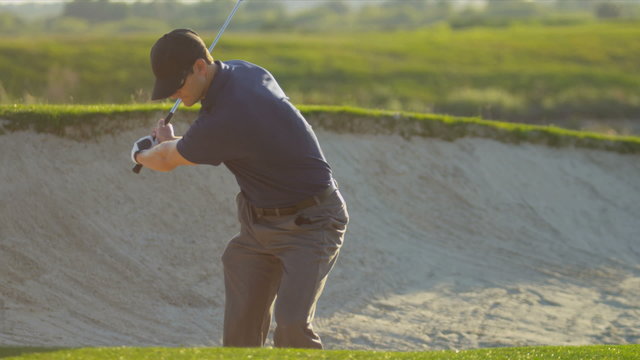 Golf Professional Playing Ball Sand Wedge