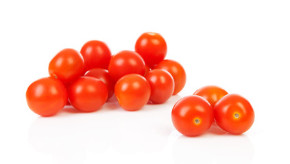 Pile of cherry tomatoes over white background