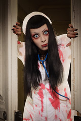 Horror movie. Crazy dead nurse