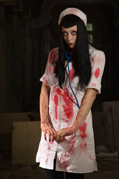 Horror movie. Crazy dead nurse