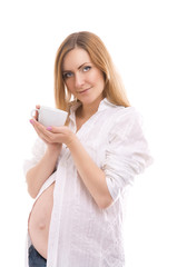 pregnant woman with tea cup