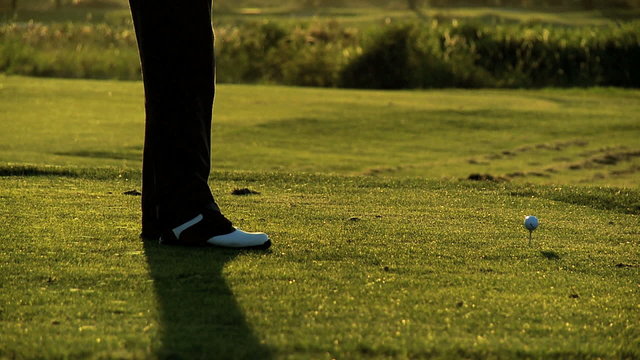 Golfer Practicing Teeing Off Golf Course Lower Body