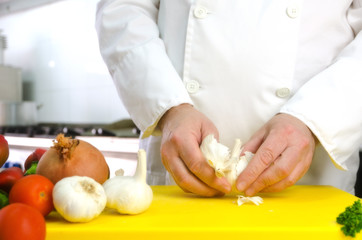 Chef hands with garlic
