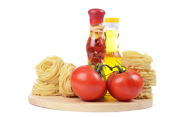 Pasta with an olive oil and tomatoes isolated