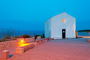 white chapel at dusk