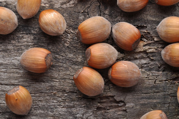 Hazelnuts on a wooden table.