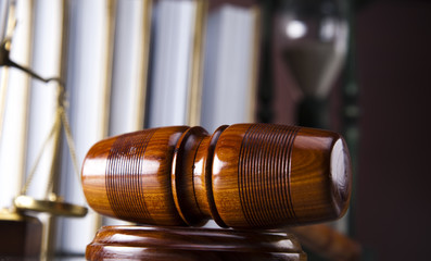 Golden scales of justice, gavel and books ,coins,hourglass