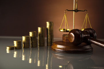 Scales of justice and gavel, gold coins
