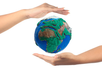 woman hand holding the globe isolate on white background with cl