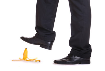 Man about to step on banana peel