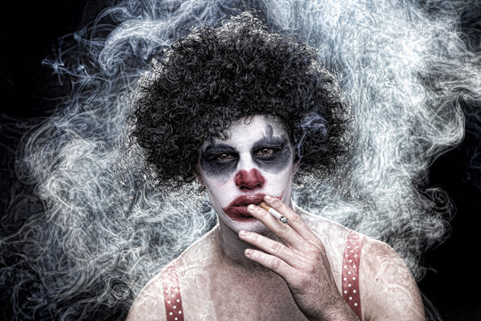 Spooky Clown Portrait on Black Background