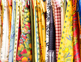 Many Colorful Table Cloths at a French Market