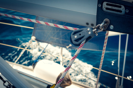 Rope and pulley on boom, sailing boat