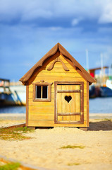 cute children playhouse near the lake