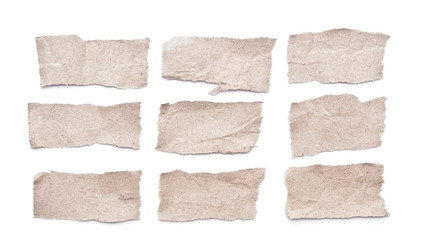 Collection of grey ripped pieces of paper