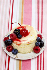 Round cake with fresh fruits