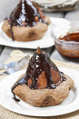 Pear in cake with chocolate sauce