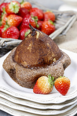 Pear in cake with chocolate sauce