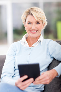 modern senior woman with tablet computer