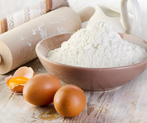 flour on wooden table