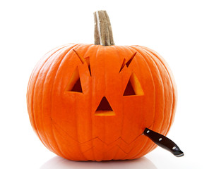 Cutting face out of pumpkin