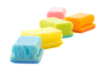 colorful cleaning sponges isolated over white