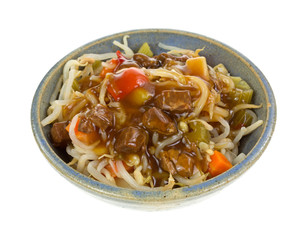 Oriental beef and vegetable meal in a grey bowl