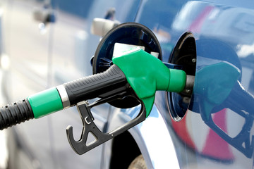 Pumping fuel in to the tank.