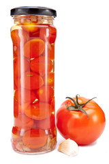 canned tomatoes in glass jars