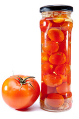Fototapeta na wymiar canned tomatoes in glass jars