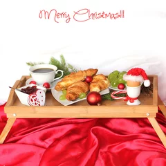 Foto op Canvas Tray with breakfast on a bed in christmas time © Alina G