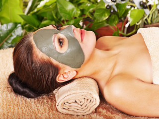 Woman getting  facial massage .