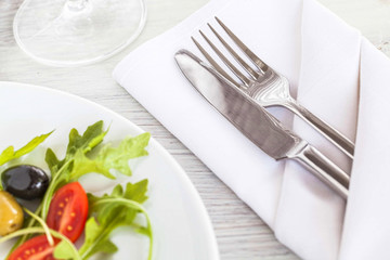 Fork and knife in elegant table setting