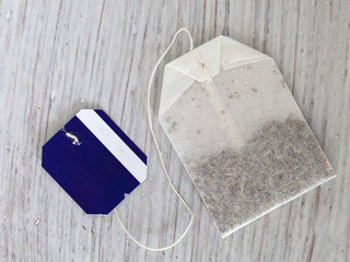 Fototapeta na wymiar Tea bag bag on wood background