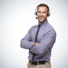 smiling man wearing a headset - 56920967