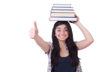 Young female student with books on white