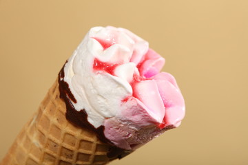 Berry icecream waffle cone on orange