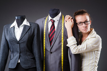 Woman tailor working on clothing