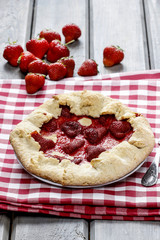 Strawberry galette. Summer pie filled with fresh juicy fruits
