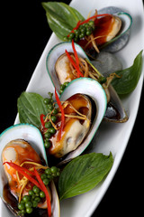New Zealand green mussels on white background
