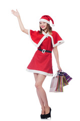 Young woman in red santa costume on white