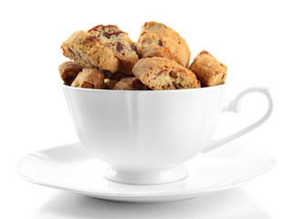 Tasty cookies in cup isolated on white