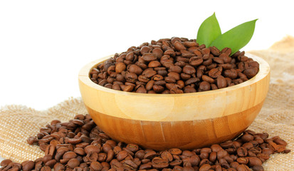 Coffee beans in bowl on white background