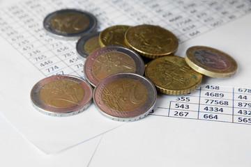 Coins and documents close up